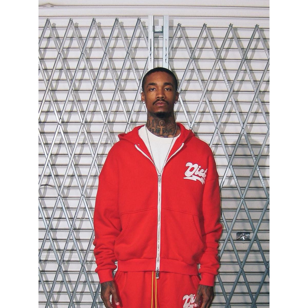 Red Diet Starts Monday full-zip hoodie with white chest logo, silver zipper, and adjustable drawstring hood.