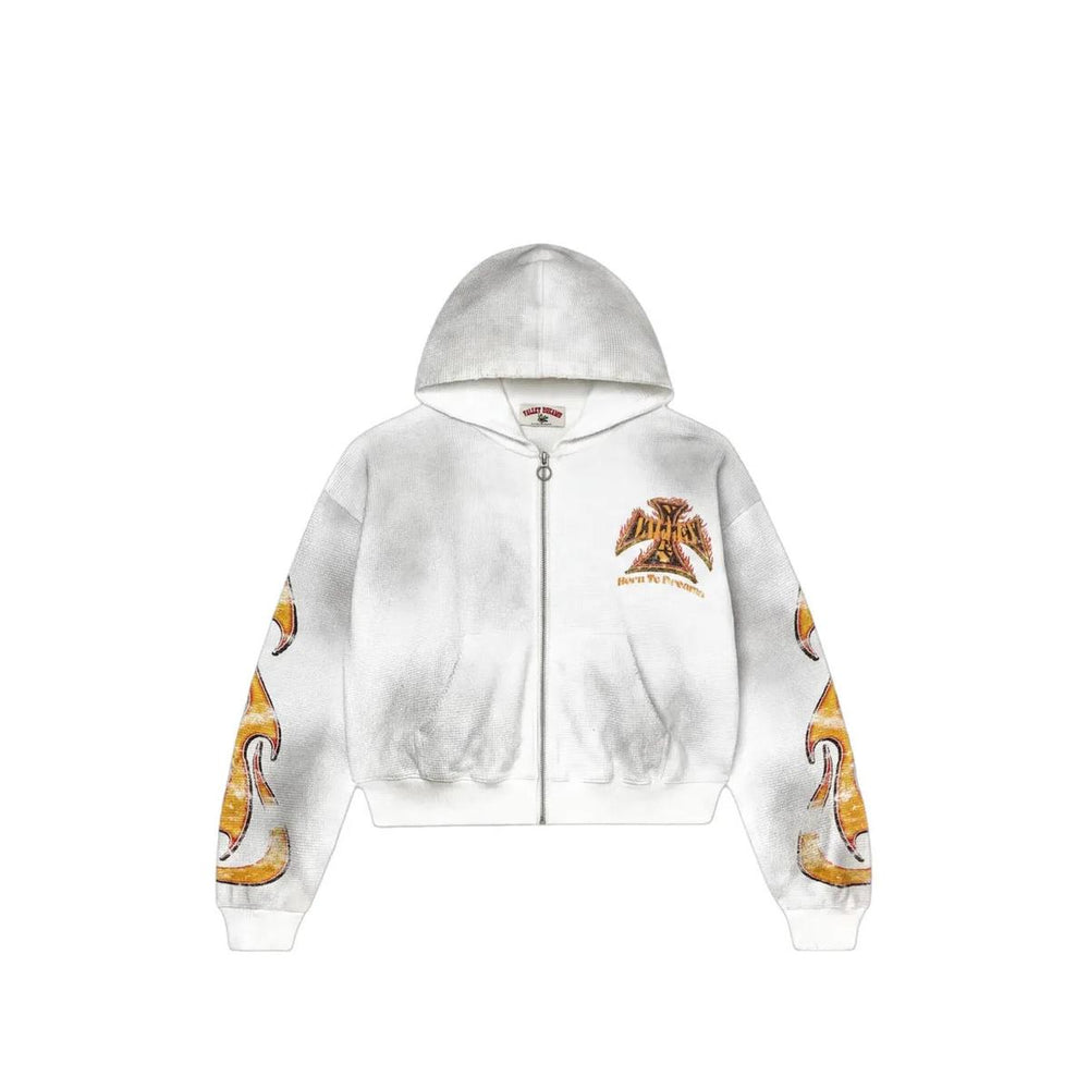 Vale Forever white waffle-textured zip-up hoodie with flame sleeve graphics and a cross chest logo.