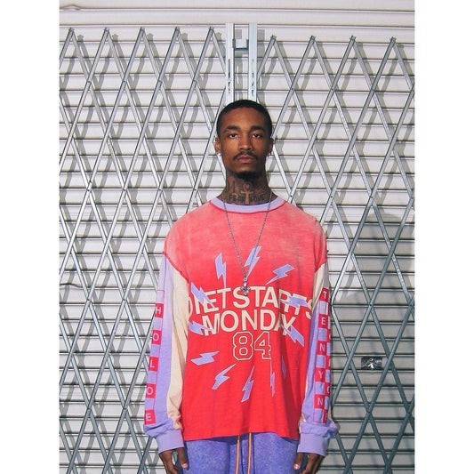 Red and purple vintage-wash long sleeve with Diet Starts Monday graphic, lightning bolts, and contrast panel sleeves.