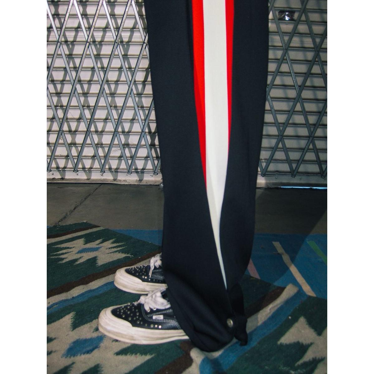 Diet Starts Monday | Striped Sweatpants - Black displaying bold red and white racing stripes with relaxed streetwear fit.