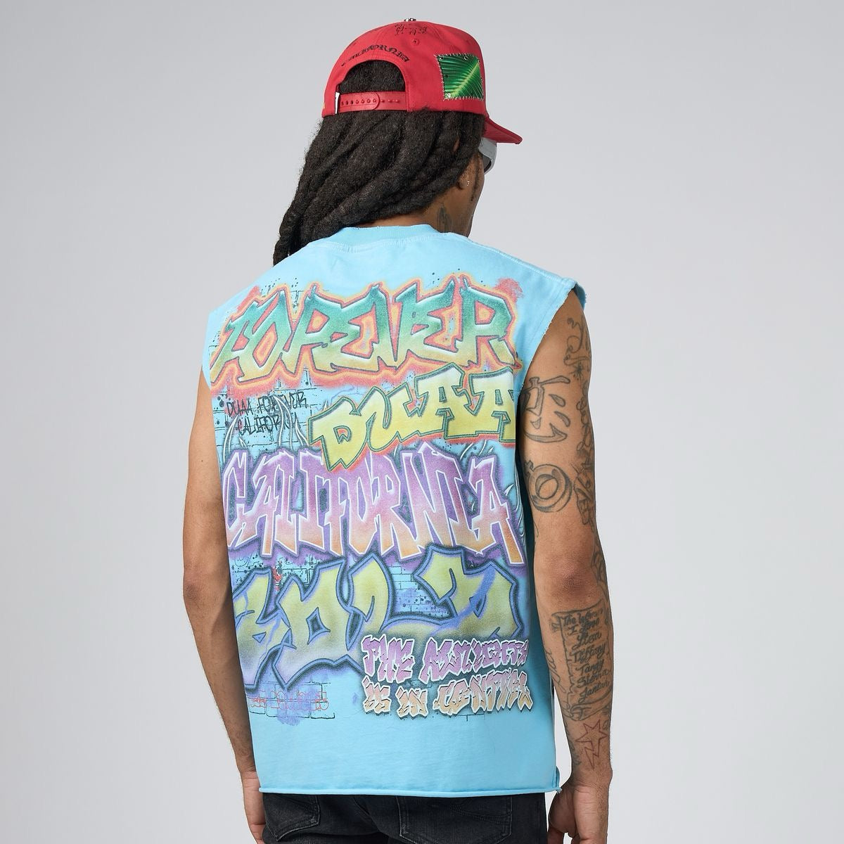 Duaa | Wall Cut Off Tee - Blue