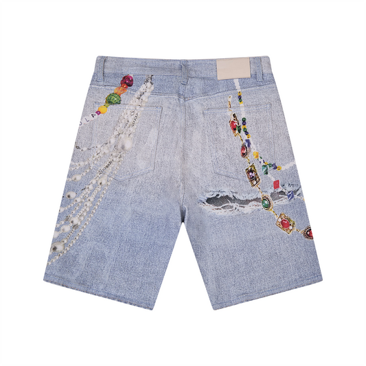 Denim shorts with colorful printed embellishments on a white background
