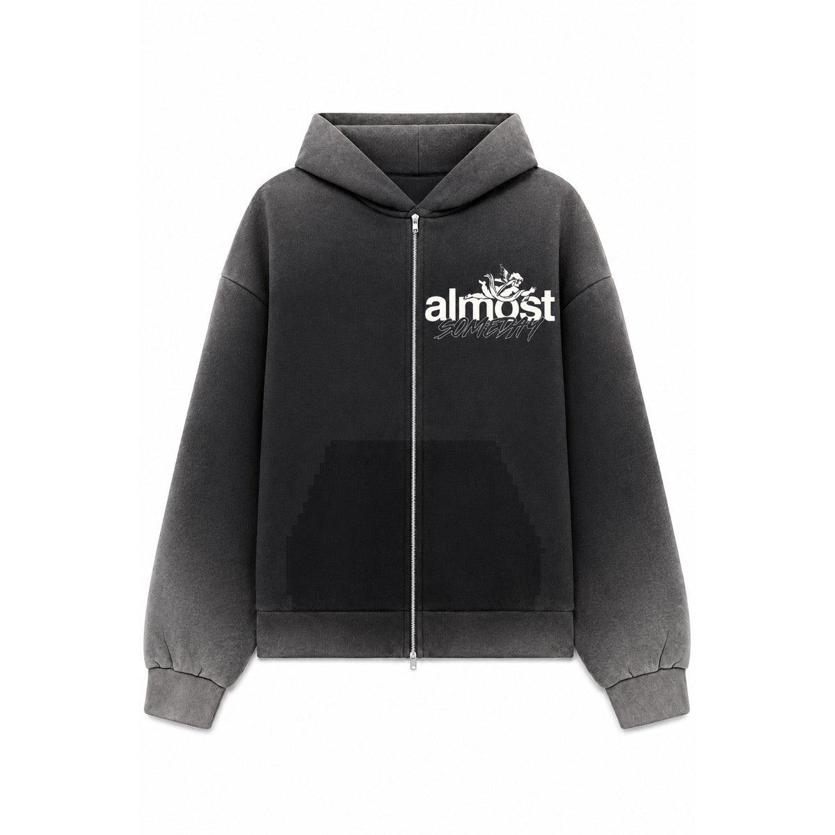 Black washed zip-up hoodie with white Almost Someday logo, front zipper, and vintage-inspired streetwear aesthetic.