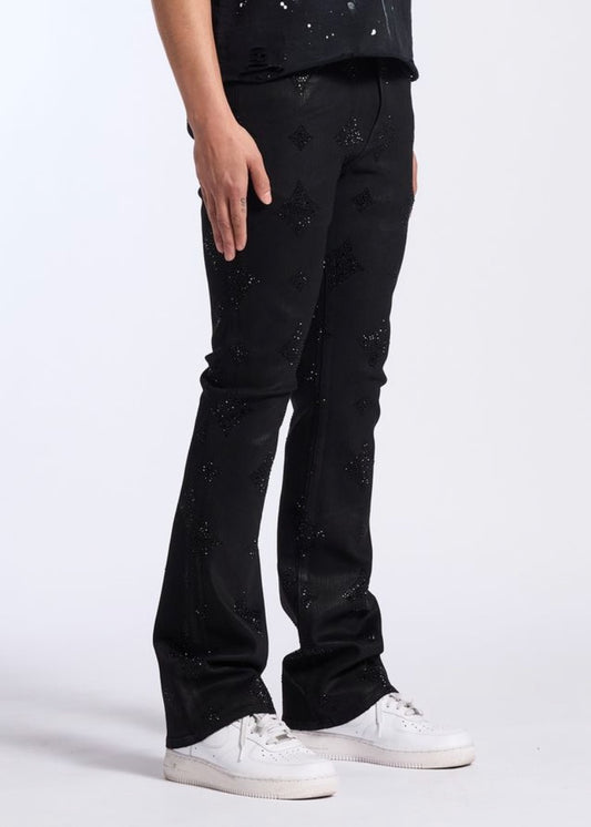 Crysp Denim | Onyx Rhinestone Stacked Pants - Black Wax worn by a model, styled with white sneakers.