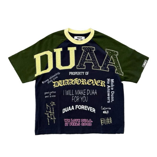 Green and black streetwear graphic tee featuring bold Duaa lettering and various inspirational text designs.