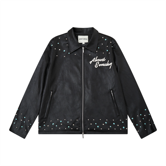 Black leather jacket with decorative elements and 'Almost Someday' text on a white background