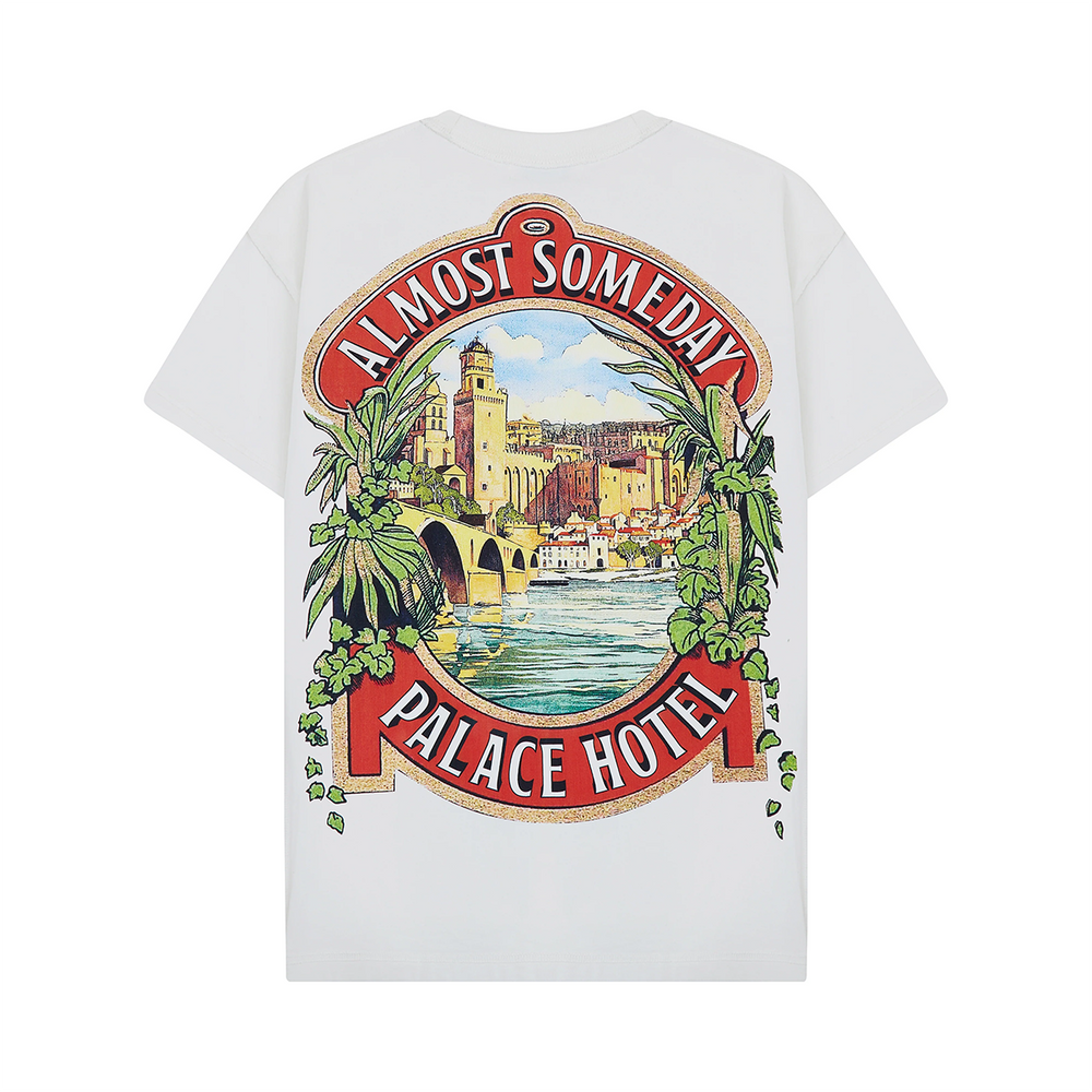 White t-shirt with 'Almost Someday Palace Hotel' graphic design on a white background